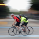 Commuter cyclists make their way through Kennington against a blurred background on Aug. 3, 2016 in London, England.